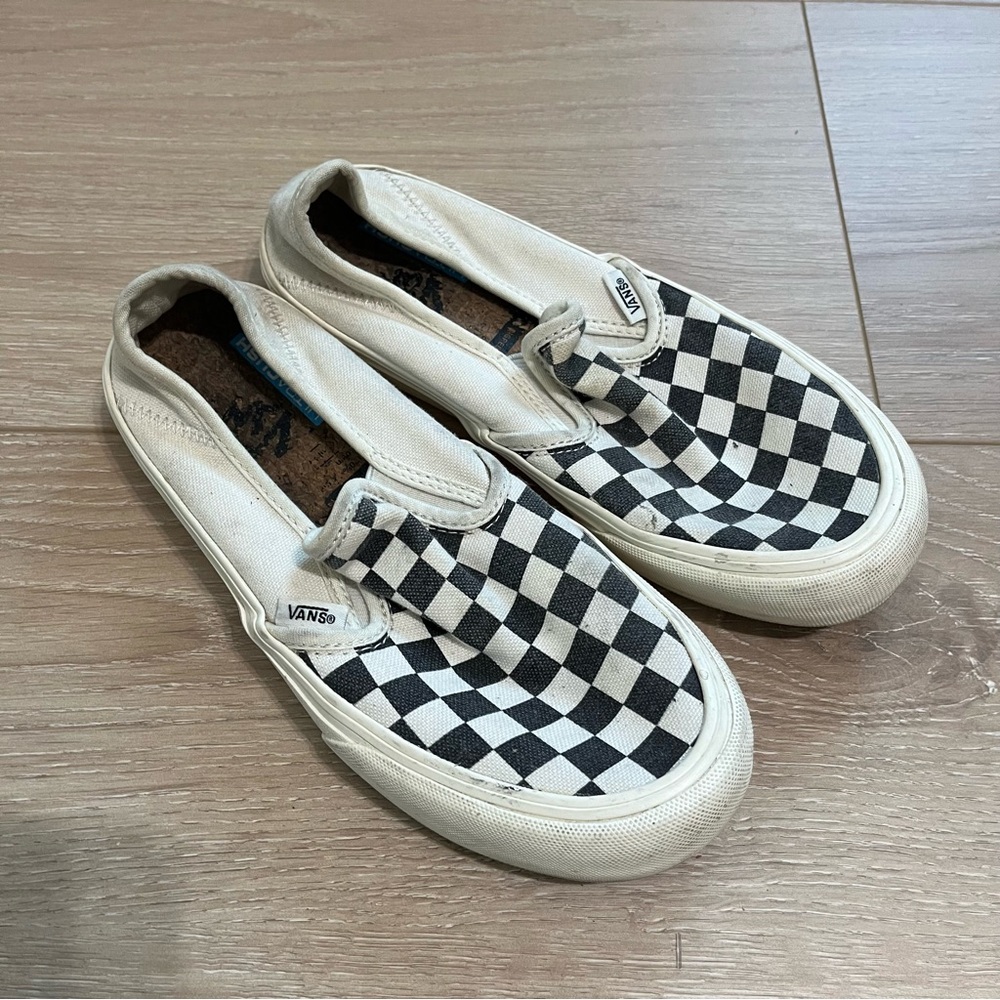 Vans Black and White Checkerboard Slip-Ons